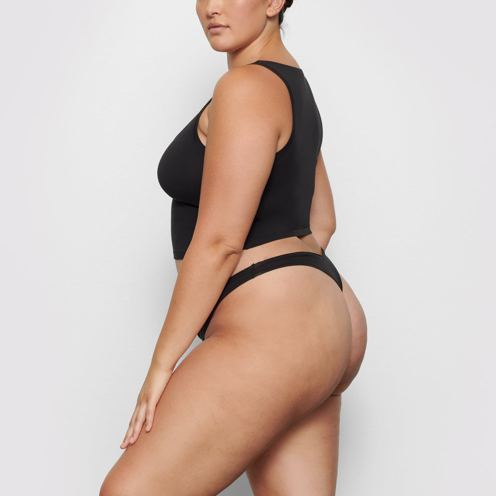 Skims COTTON JERSEY DIPPED Thong Čierne | NKFH-05697