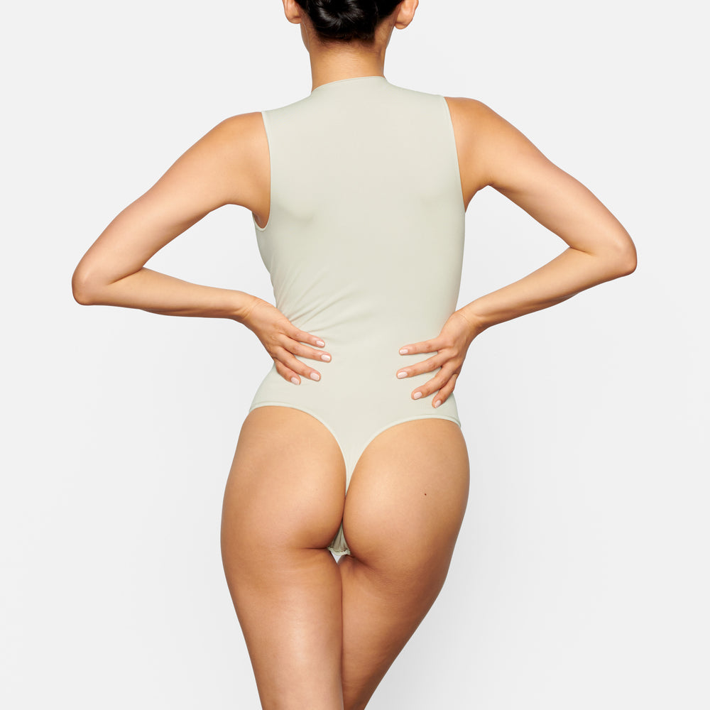 Skims ESSENTIAL CREW NECK Sleeveless Bodysuit Biele | NGUB-76843