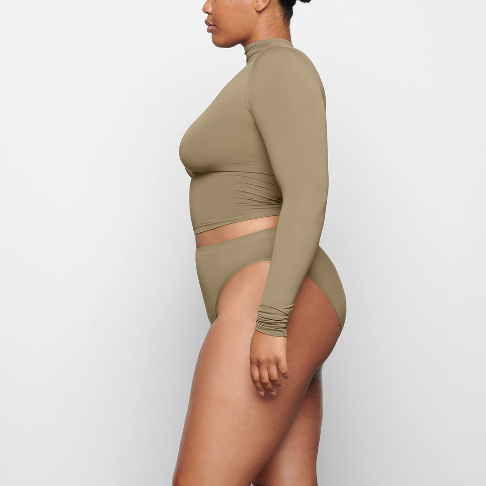 Skims SOFT SMOOTHING TURTLENECK TOP T-shirt Zelene | WLBV-47328