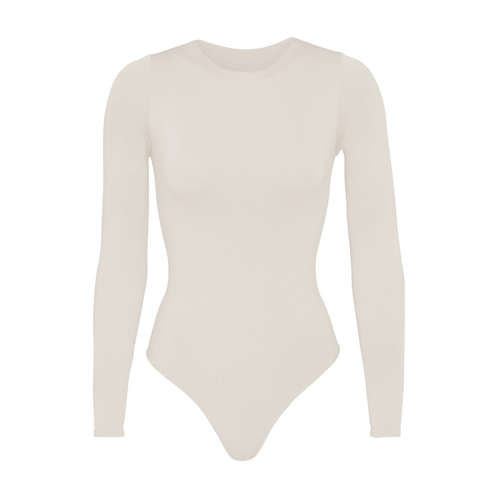 Skims ESSENTIAL CREW NECK Long Sleeve Bodysuit Biele | SWCO-07954